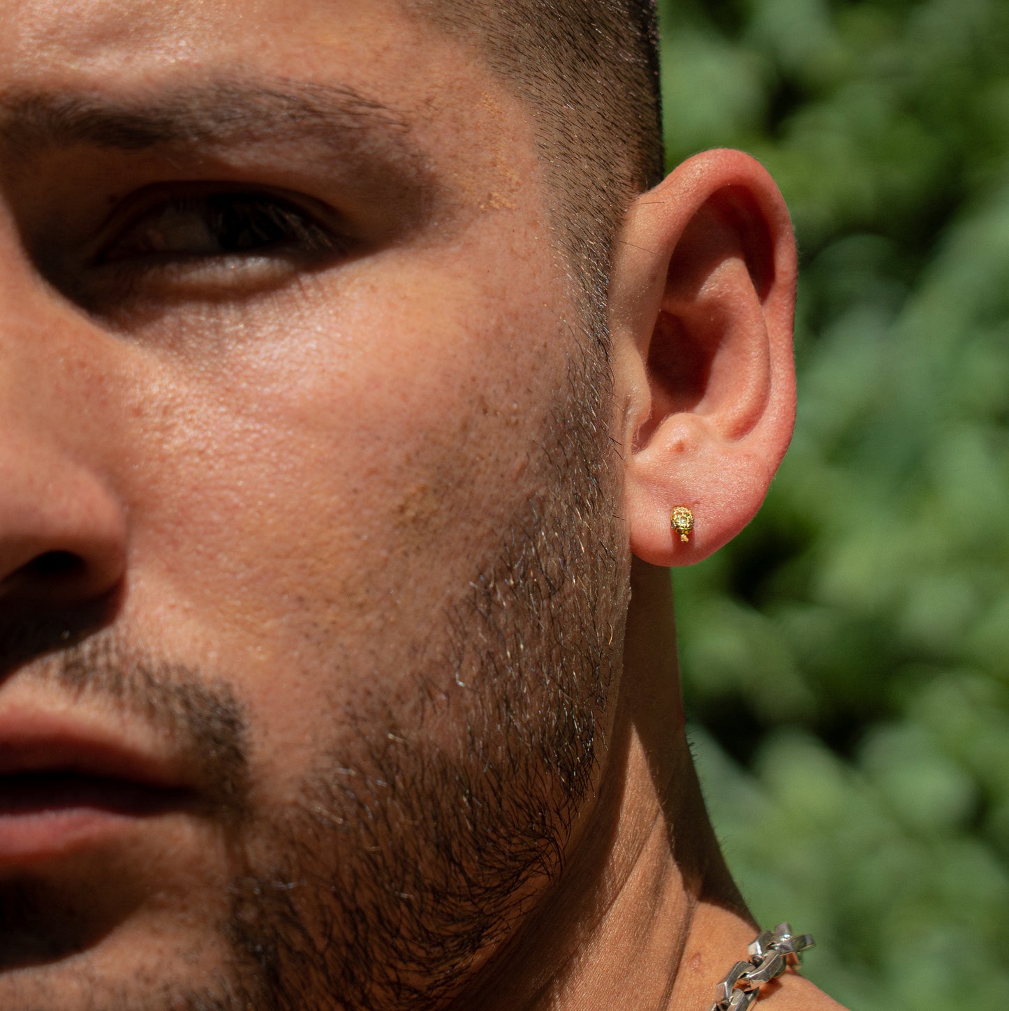 Arete coatl oro amarillo de 18K con diamantes