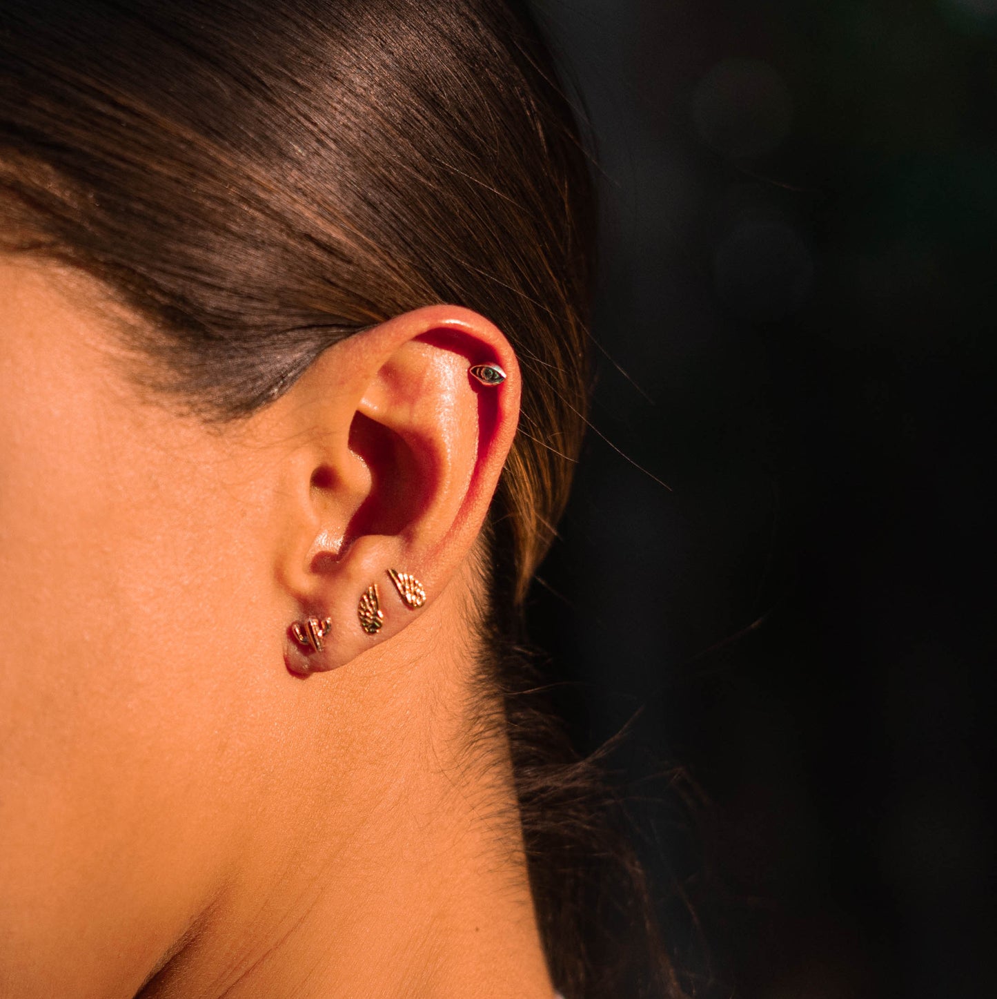Arete ala derecha oro amarillo 14 K